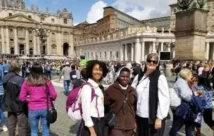 Sisters standing in the middle of Rome
