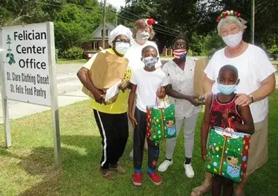 Sisters and families celebrate Christmas in July