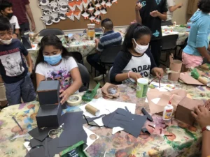 Children doing crafts at Mooncrest