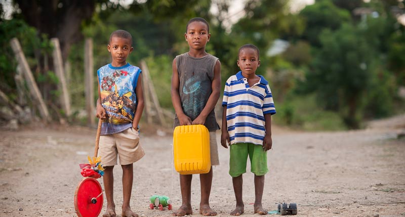 Haitian children along a dirt road